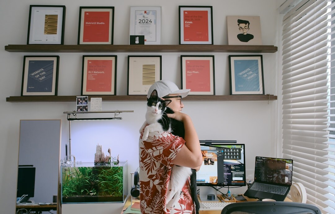 Photographers reviewing photo prints together at a desk
